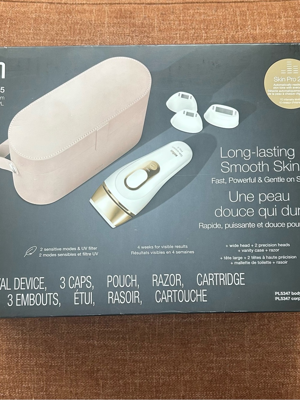 White and Gold Personal Hair Removal Device with Pink Pouch